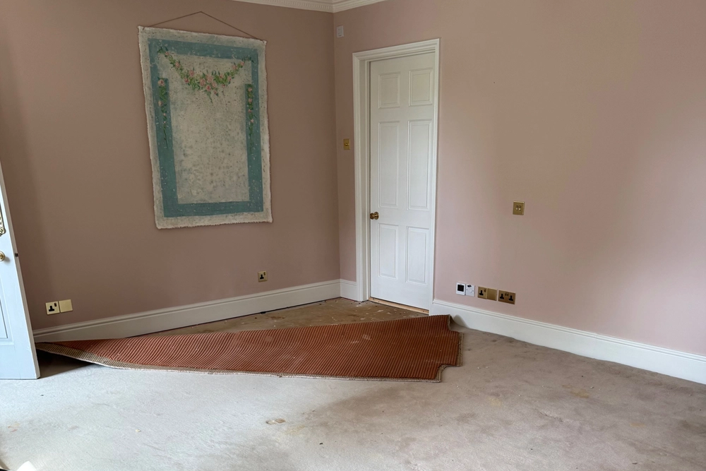 Chipboard subfloor over 18th Century Joists - Before