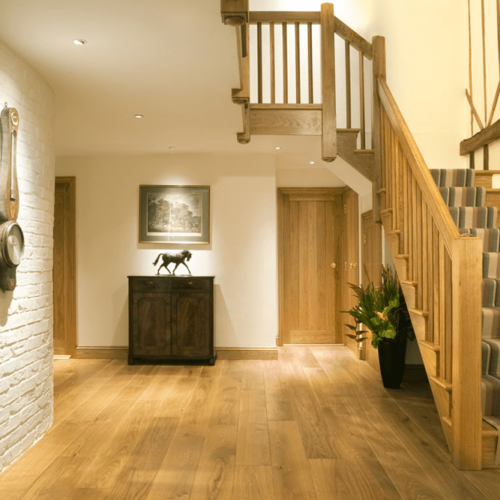 Character Grade engineered Oak over underfloor heating with complementary doors and joinery.
