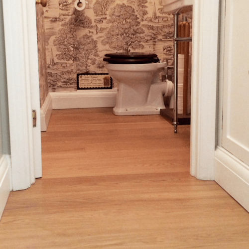 Prime engineered oak in a WC finished with a top coat of Raw Hardwax oil.